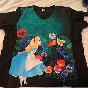 Alice in wonderland scrub top . In good condition !